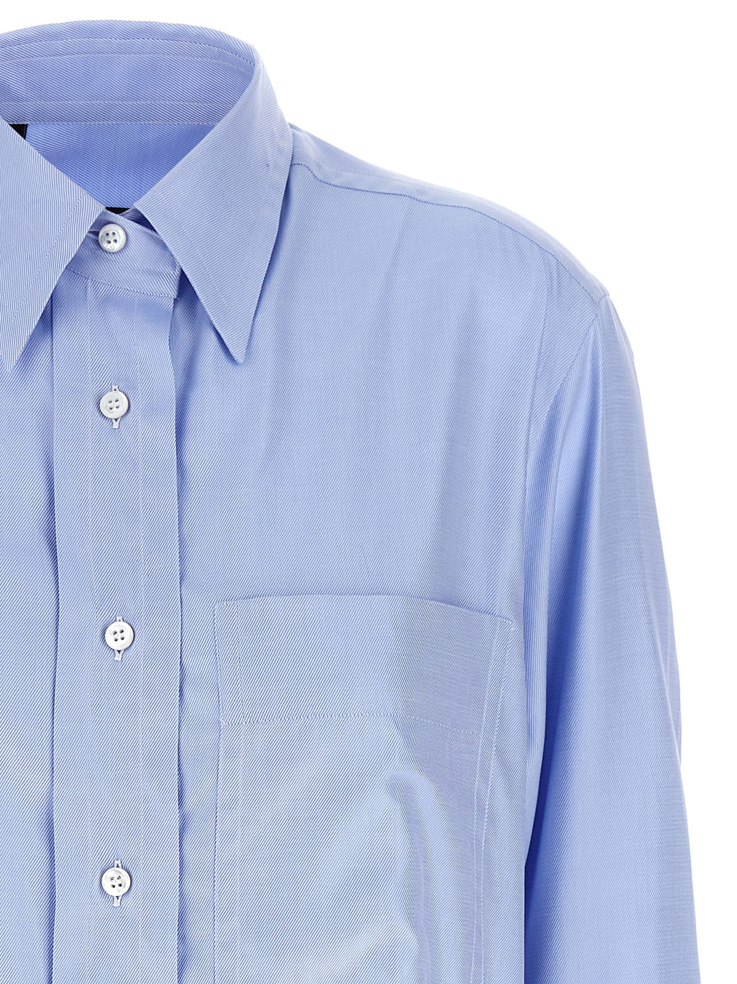 Blouse by Brioni for women in cotton twill light-blue showcases a sleek silhouette, elegantly detailed with a sleek and for a sleek finish.