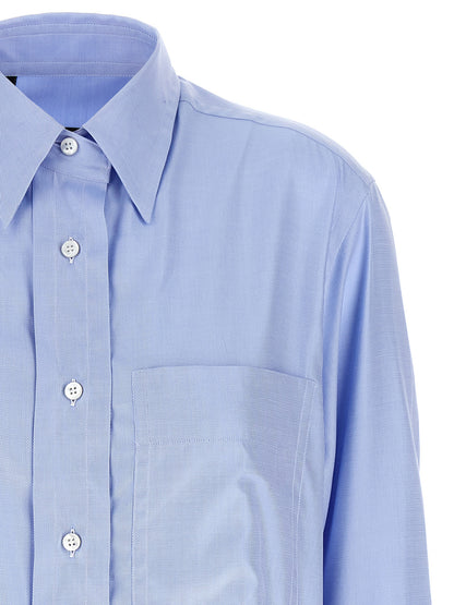 Blouse by Brioni for women in cotton twill light-blue showcases a sleek silhouette, elegantly detailed with a sleek and for a sleek finish.