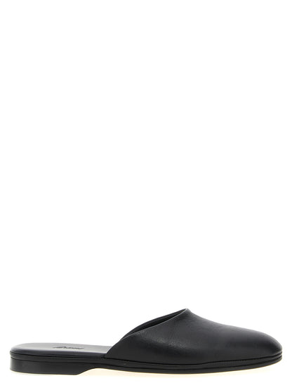 Mules Flat Shoes by Brioni for women in calfskin leather black showcases a dynamic silhouette, artfully capturing Women's Calfskin Leather Mules Flat Shoes through its distinctive and elegant .