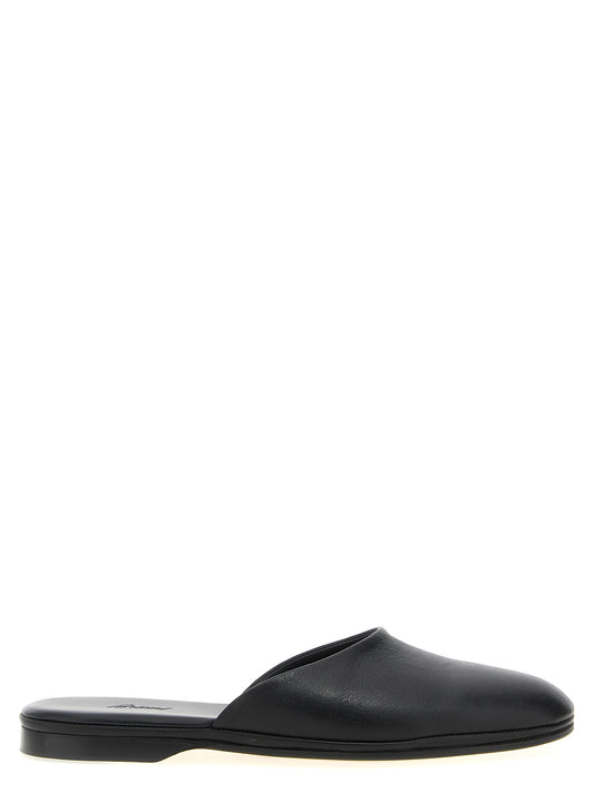 Mules Flat Shoes by Brioni for women in calfskin leather black showcases a dynamic silhouette, artfully capturing Women's Calfskin Leather Mules Flat Shoes through its distinctive and elegant .