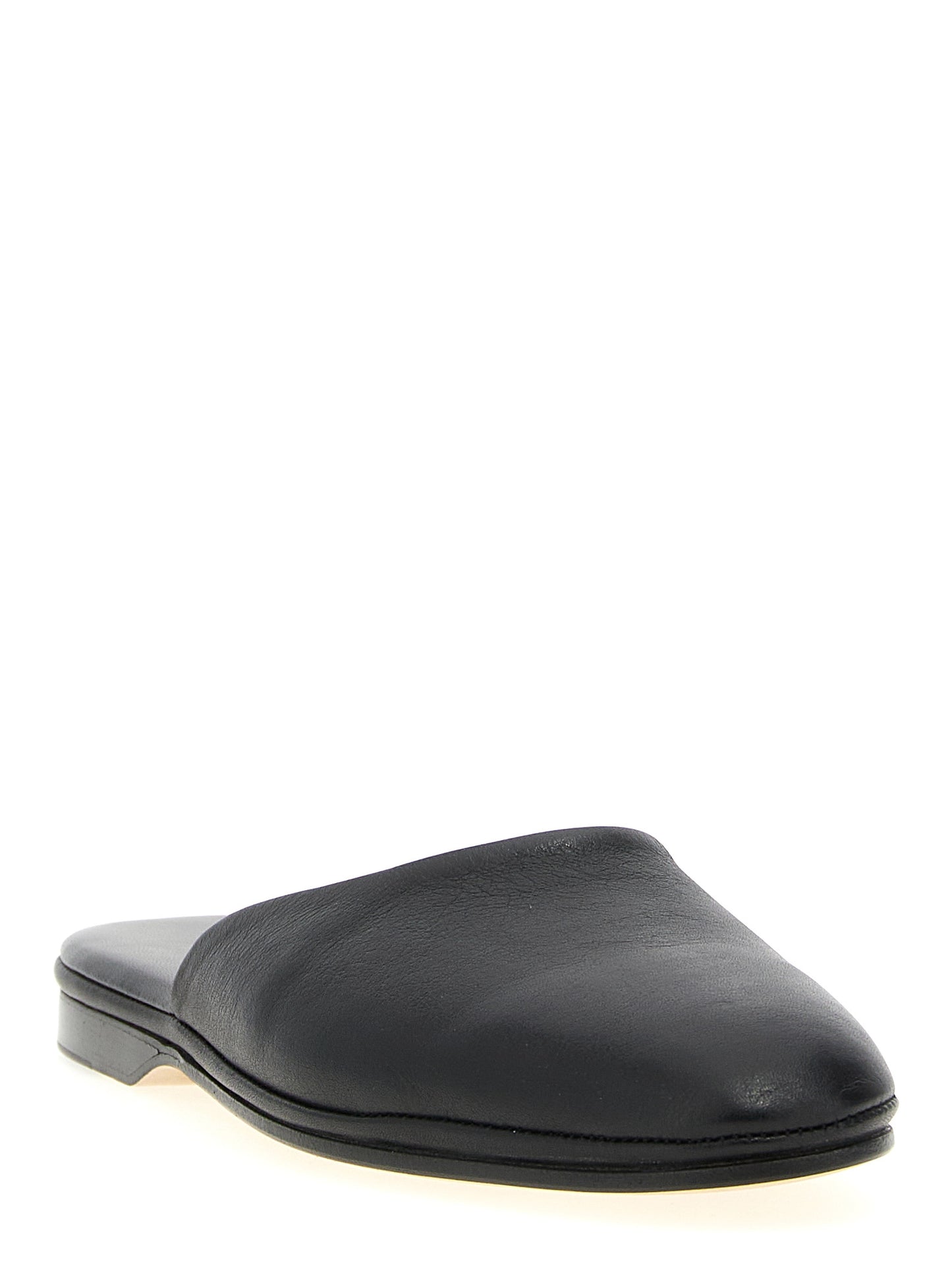 Mules Flat Shoes by Brioni for women in calfskin leather black features an captivating silhouette, showcasing the captivating style of the Women's Calfskin Leather Mules Flat Shoes with its distinct and refined .