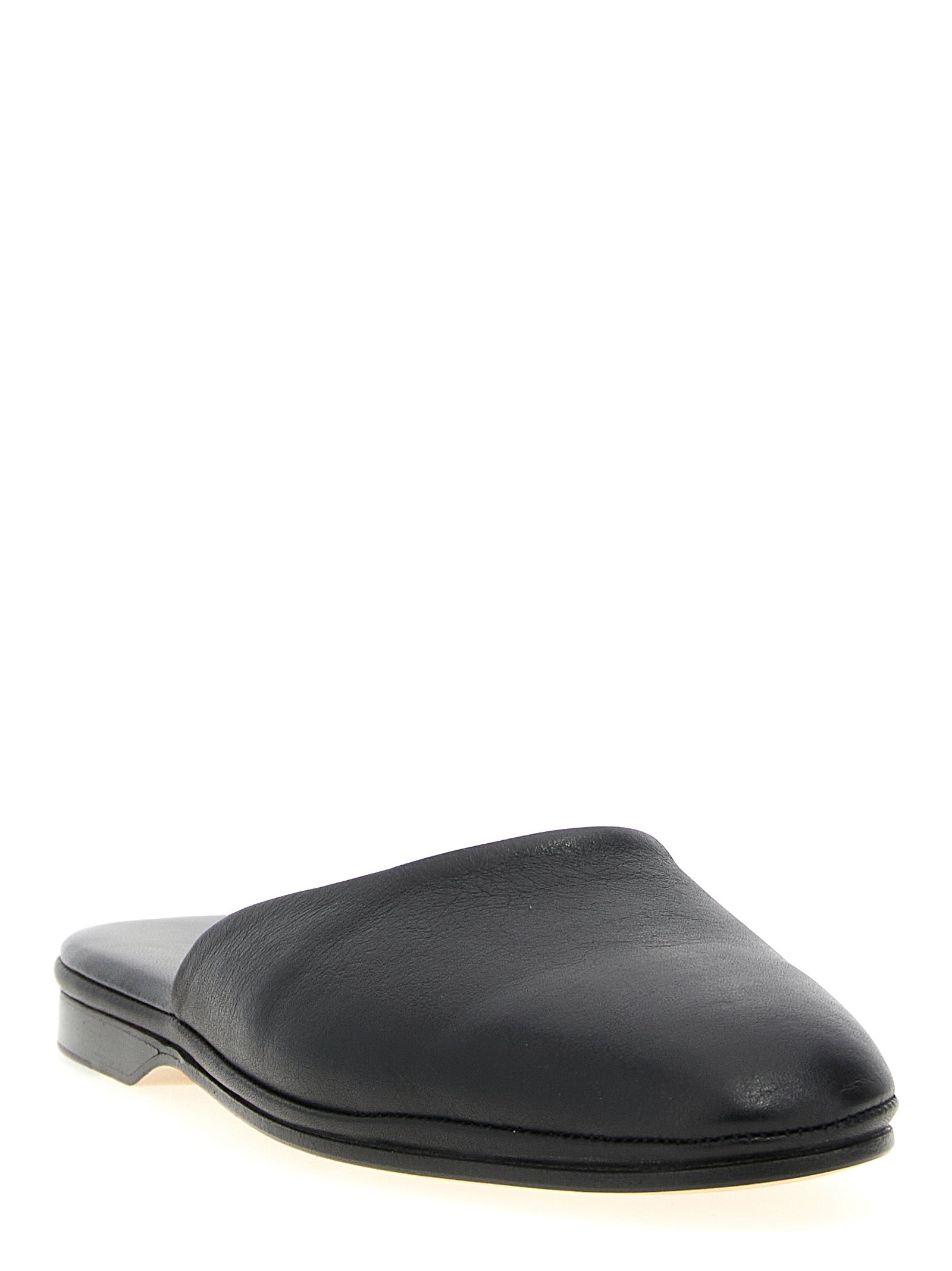 Mules Flat Shoes by Brioni for women in calfskin leather black features an captivating silhouette, showcasing the captivating style of the Women's Calfskin Leather Mules Flat Shoes with its distinct and refined .