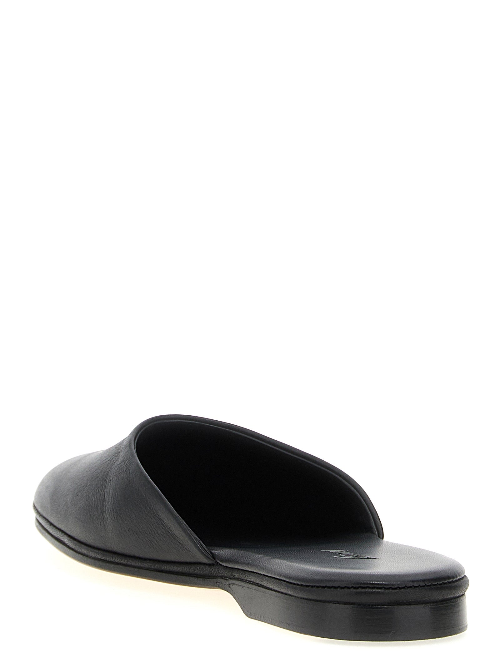 Mules Flat Shoes by Brioni for women in calfskin leather black showcases a resplendent Women's Calfskin Leather Mules Flat Shoes aesthetic with a and .