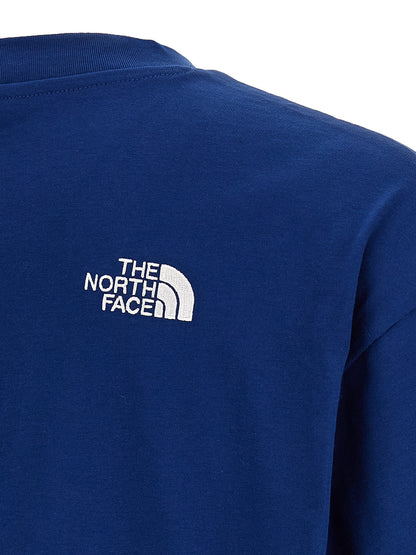 T-Shirt by The North Face for men in cotton blue showcases a fashionable silhouette, elegantly detailed with a fashionable and for a sophisticated, high-fashion look.