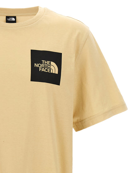 T-Shirt by The North Face for men in cotton polyester beige & print showcases a unassuming silhouette, artfully detailed with a refined crew neckline and unassuming for a sophisticated, contemporary look.