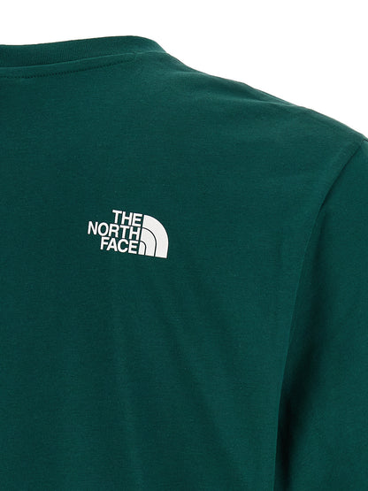 T-Shirt by The North Face for men in cotton polyester bicolour, green & print showcases a fashionable silhouette, elegantly detailed with a fashionable and for a sophisticated, high-fashion look.