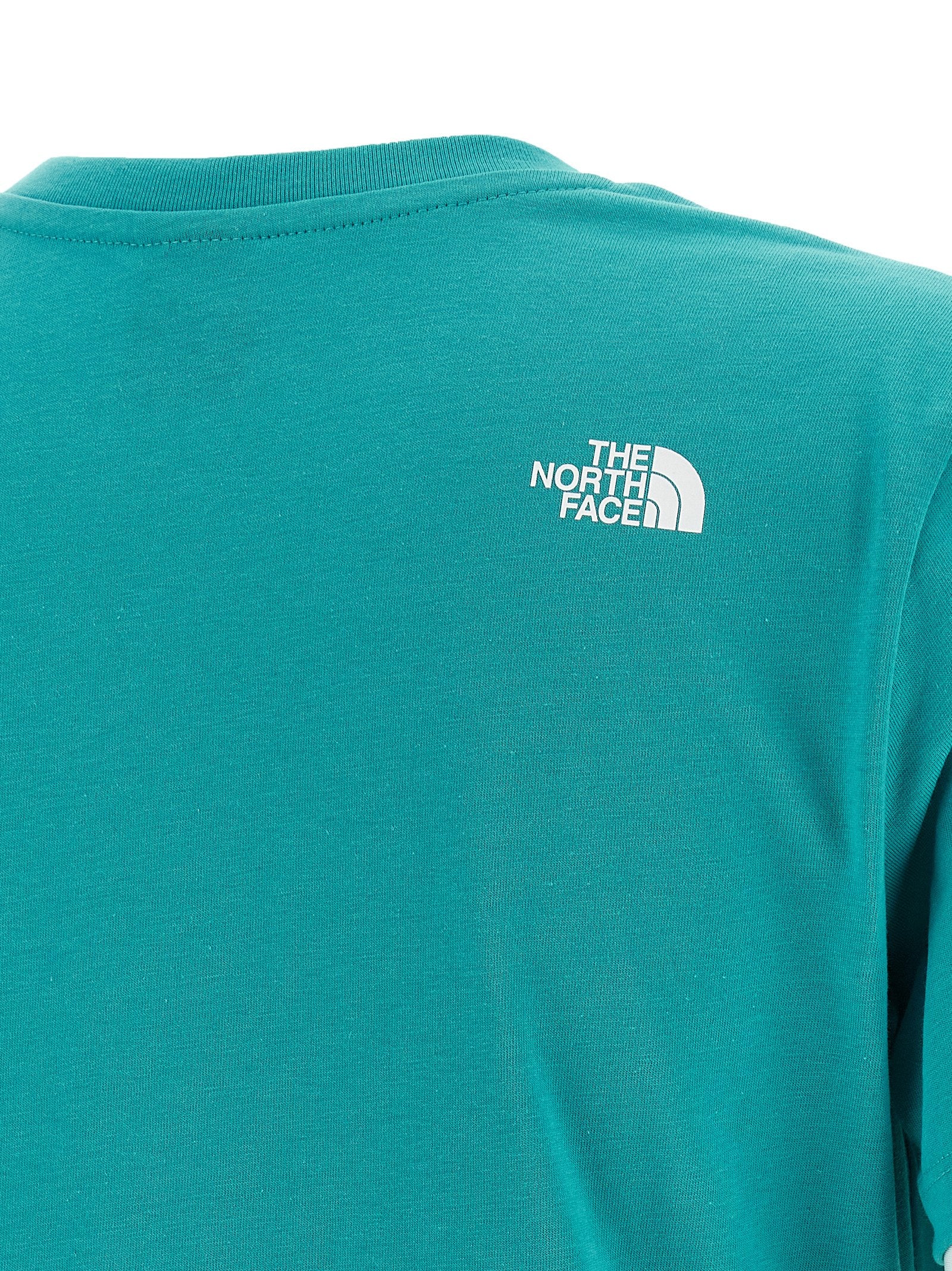 Activewear T-Shirt by The North Face for women in cotton polyester light-blue & print features a dynamic silhouette with and enhanced by functional .