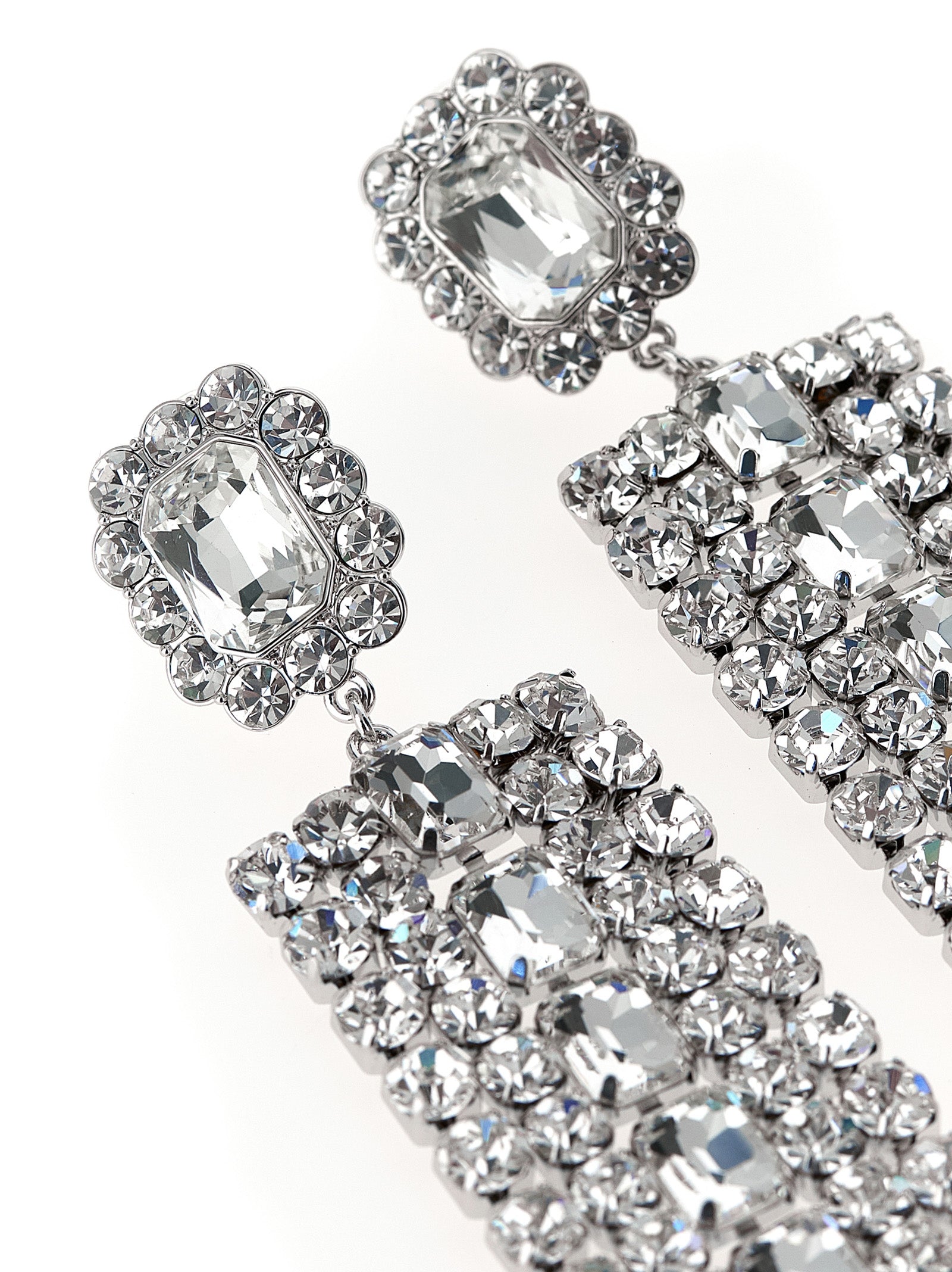 Earrings by Self-Portrait for women in virgin wool silver showcases a enchanting silhouette, artfully incorporating the intricate seen in the Women's Silver Brass Crystal & Cotton Earrings.