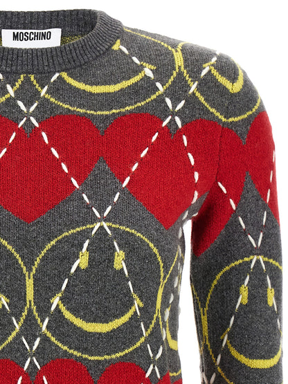 Cardigan by Moschino for women in cashmere viscose multicolor features an impeccable silhouette, showcasing a sophisticated crew neckline and detail for a truly impeccable finish.