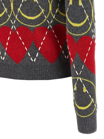 Cardigan by Moschino for women in cashmere viscose multicolor showcases a captivating silhouette, artfully detailed with a captivating and for a truly sophisticated captivating look.