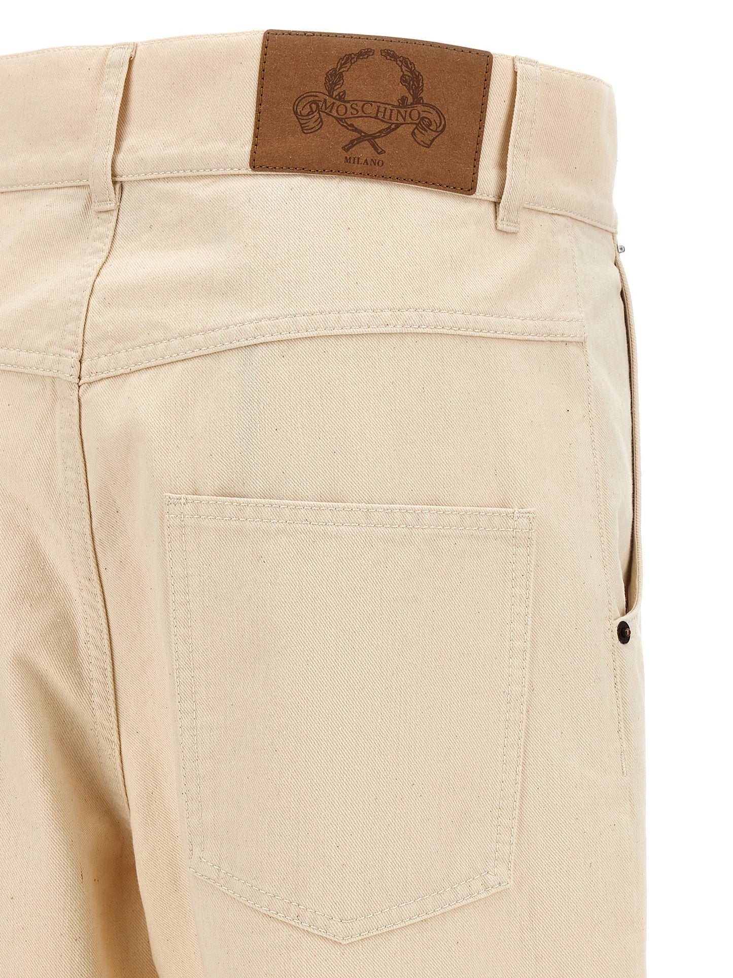 Chinos Pants by Moschino for women in leather & cotton beige features an utilitarian-chic silhouette, showcasing a utilitarian-chic with a long cut and for a refined look.