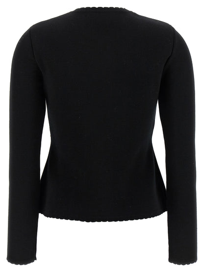Cardigan by Moschino for women in merino virgin wool black showcases a captivating silhouette, artfully detailed with a captivating and crew neckline for a truly sophisticated captivating look.