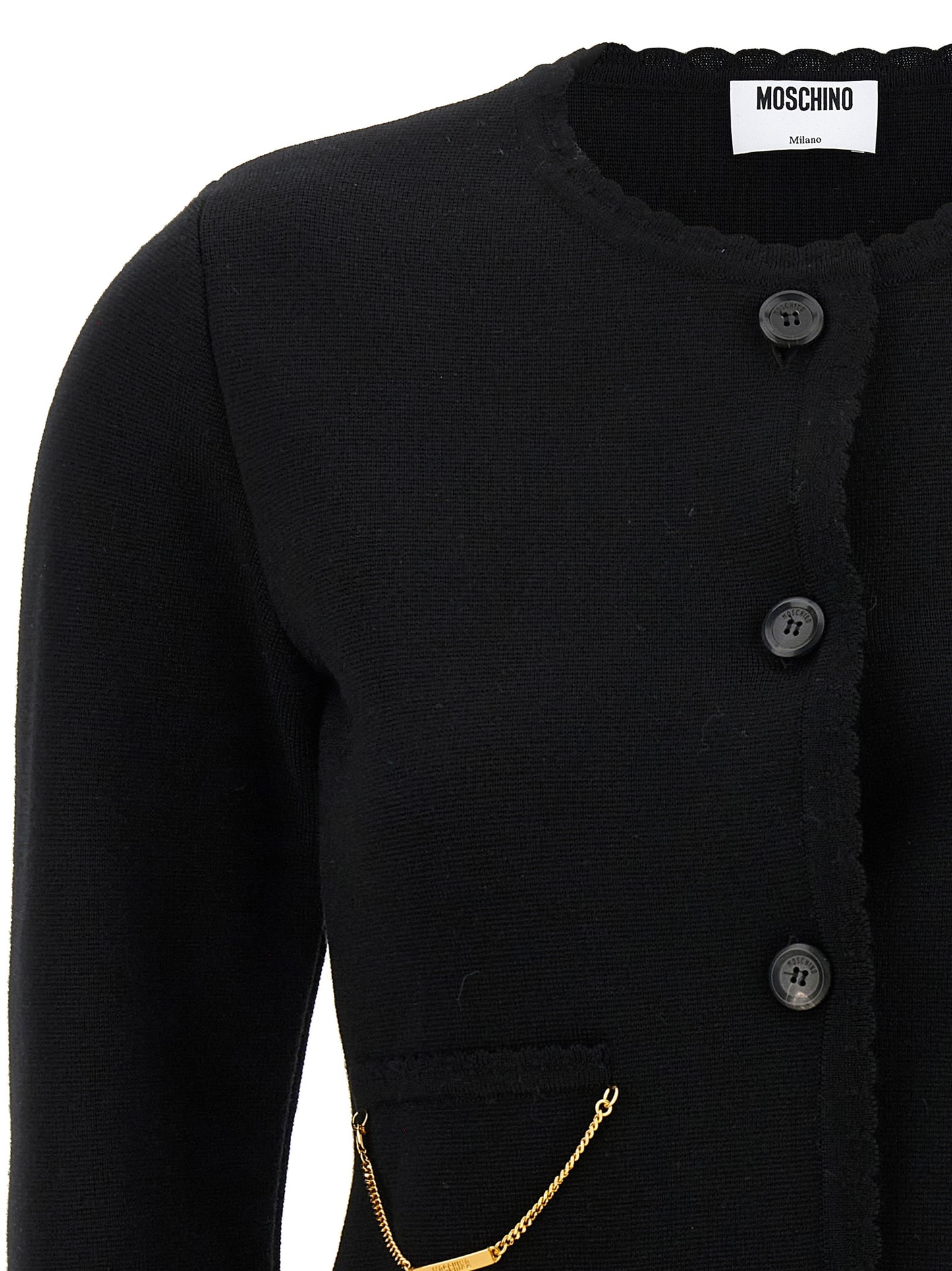 Cardigan by Moschino for women in merino virgin wool black features a dramatic silhouette, showcasing a sophisticated crew neckline and dramatic detail for a timeless, premium look.