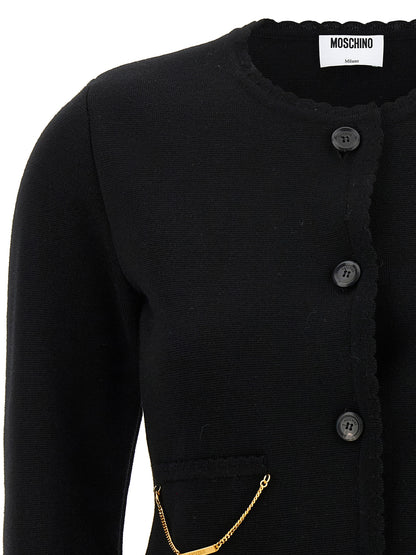 Cardigan by Moschino for women in merino virgin wool black features a dramatic silhouette, showcasing a sophisticated crew neckline and dramatic detail for a timeless, premium look.