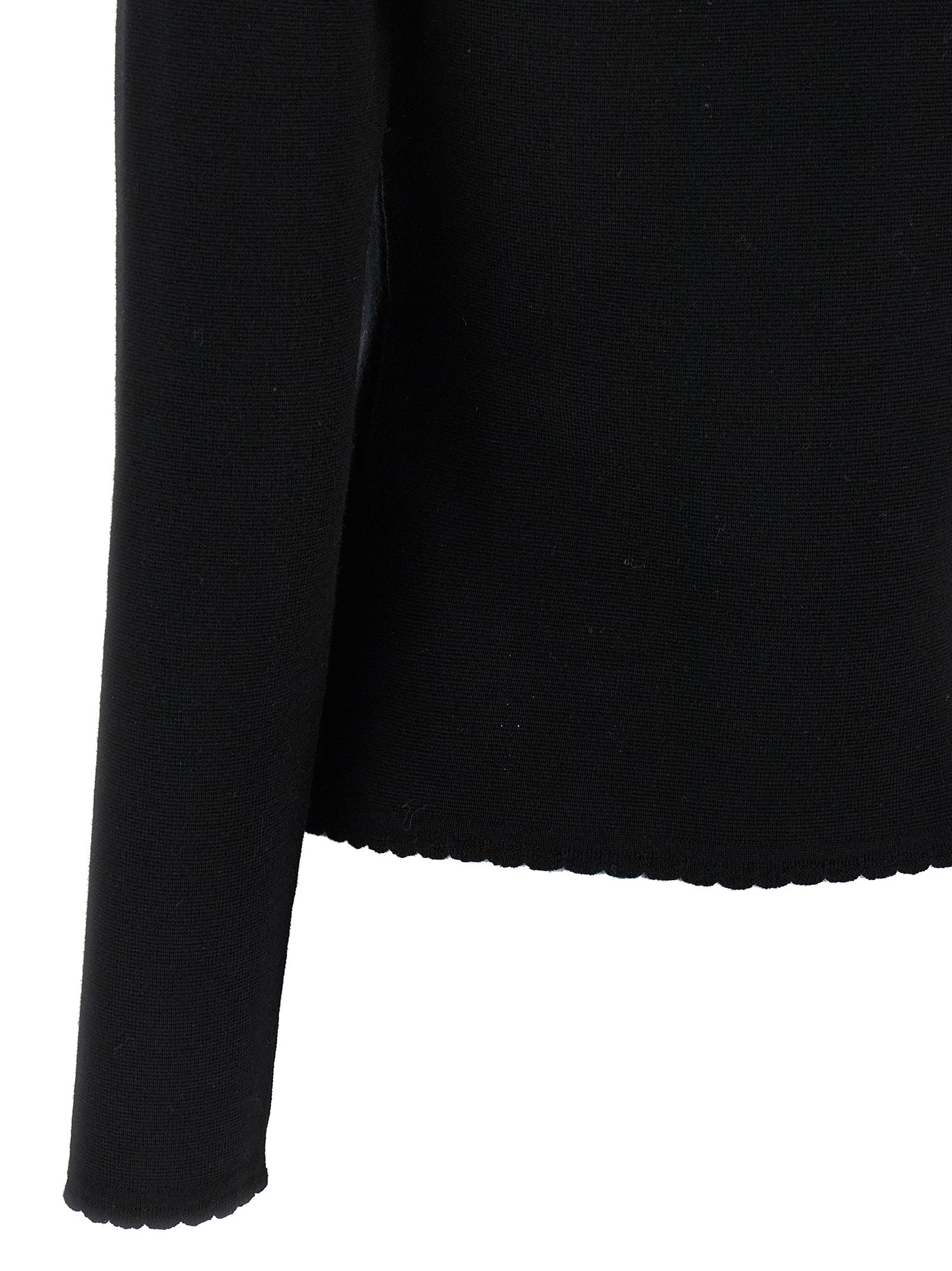 Cardigan by Moschino for women in merino virgin wool black features an impeccable silhouette, showcasing a sophisticated and detail for a truly impeccable finish.