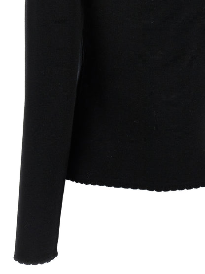 Cardigan by Moschino for women in merino virgin wool black features an impeccable silhouette, showcasing a sophisticated and detail for a truly impeccable finish.
