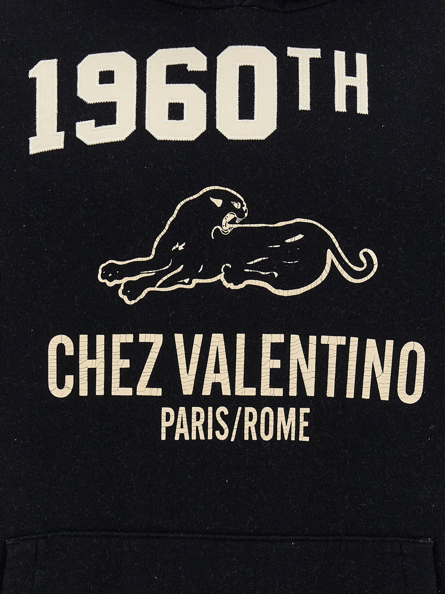 Sweatshirt Hoodie by Valentino Garavani for men in cotton black & print features an dramatic silhouette, showcasing a sophisticated and dramatic for a refined, modern aesthetic.
