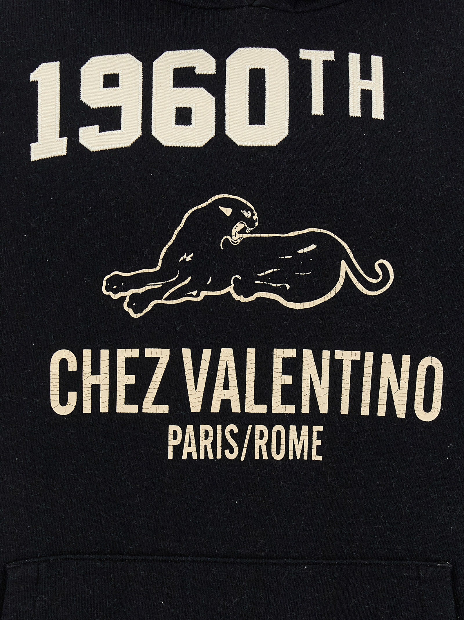 Sweatshirt Hoodie by Valentino Garavani for men in cotton black & print features an dramatic silhouette, showcasing a sophisticated and dramatic for a refined, modern aesthetic.