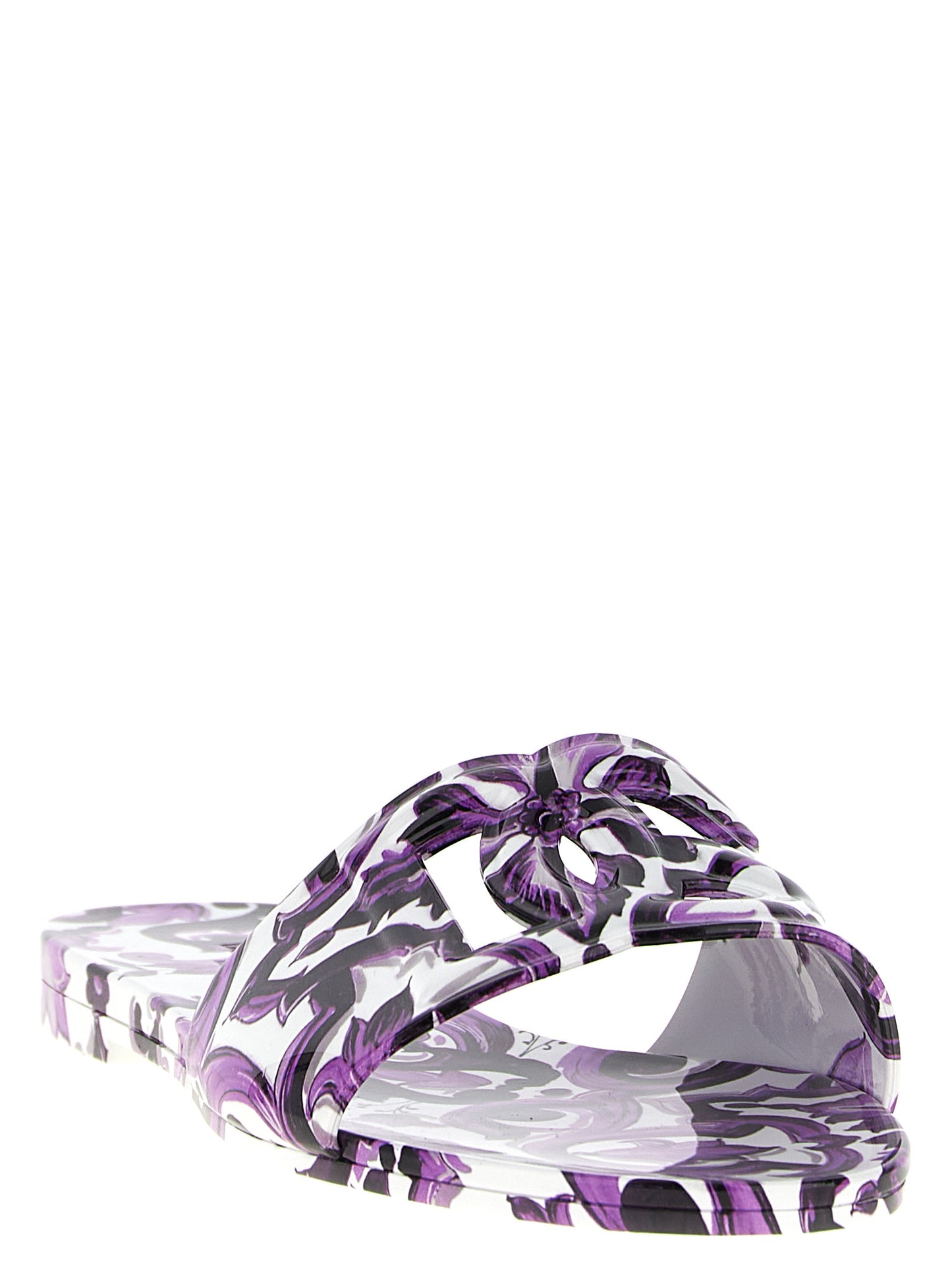 Sliders Flat Shoes by Dolce & Gabbana for women in thermoplastic polyurethane purple & print showcases a enchanting silhouette as part of the Maiolica Women's Thermoplastic Polyurethane Sliders Flat Shoes collection, defined by a enchanting and for a enchanting look.