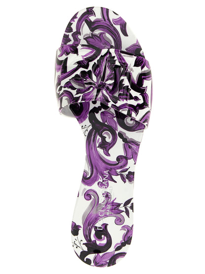 Sliders Flat Shoes by Dolce & Gabbana for women in thermoplastic polyurethane purple & print presents a effortless chic silhouette, showcasing the Maiolica Women's Thermoplastic Polyurethane Sliders Flat Shoes design with a effortless chic and for a sophisticated look.