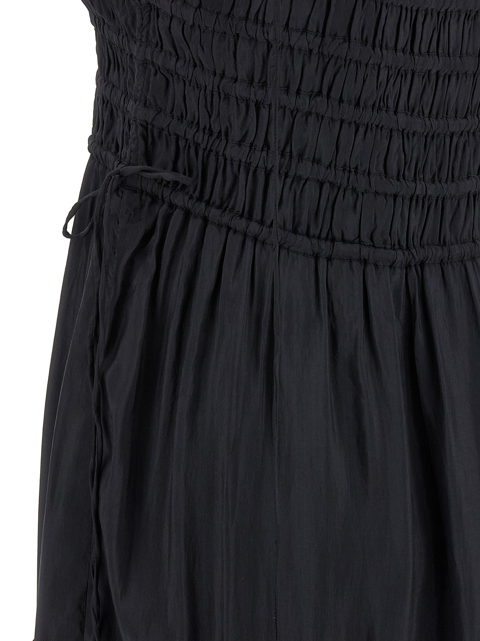 Dress by Ganni for women in viscose gray features an cute silhouette, detailed with a and that elegantly flows into a cute maxi long.