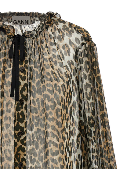 Blouse by Ganni for women in viscose chiffon brown, transparent, leopard-print & print showcases a sleek silhouette, elegantly detailed with a sleek crew neckline and for a sleek finish.