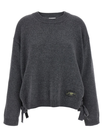 Cardigan by Ganni for women in wool & viscose gray features an impeccable silhouette, showcasing a sophisticated crew neckline and long-sleeve detail for a truly impeccable finish.