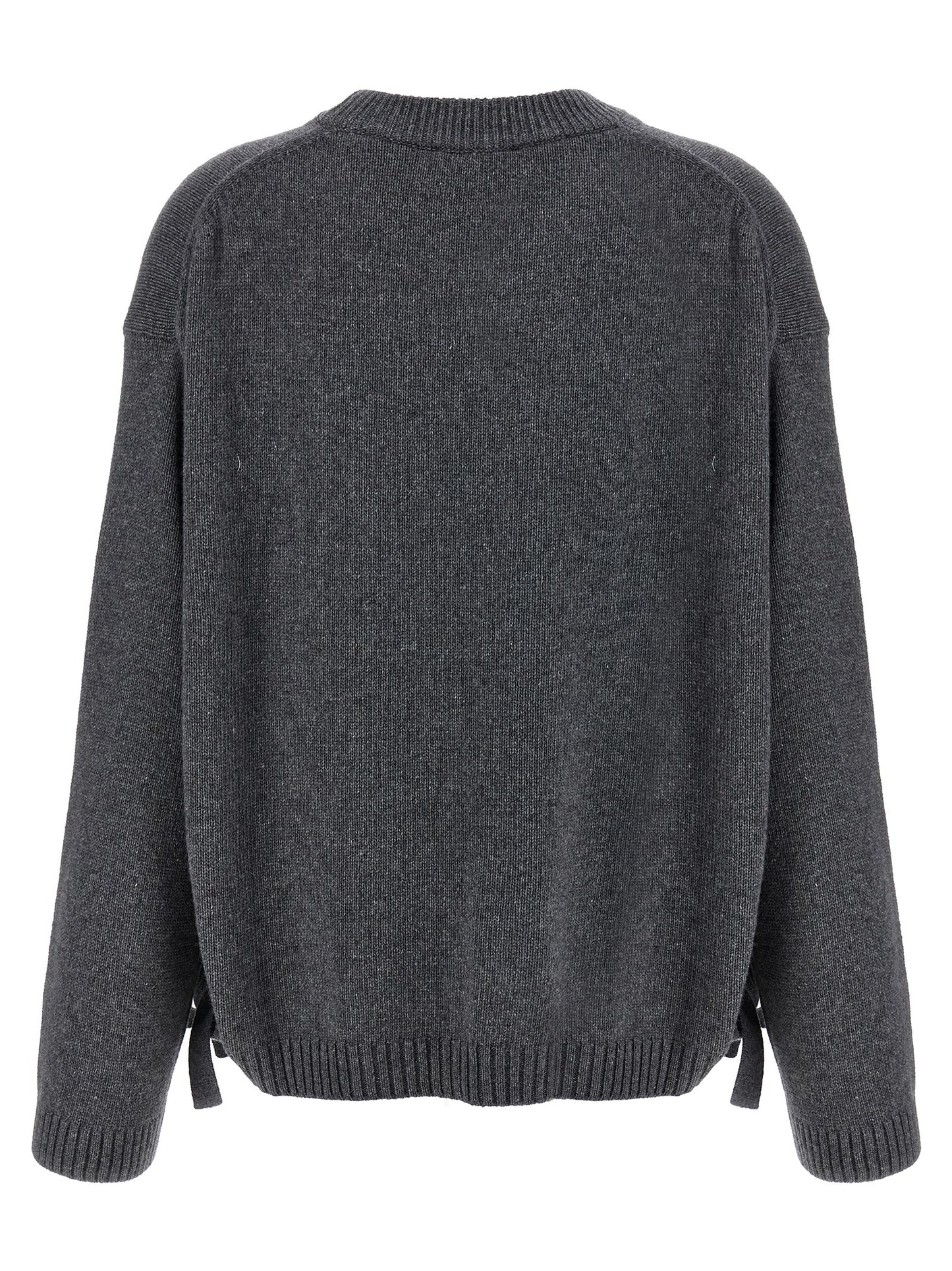 Cardigan by Ganni for women in wool & viscose gray features an crisp silhouette, showcasing a sophisticated crew neckline and detail for a truly crisp finish.