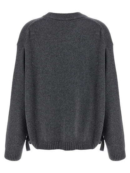 Cardigan by Ganni for women in wool & viscose gray features an crisp silhouette, showcasing a sophisticated crew neckline and detail for a truly crisp finish.