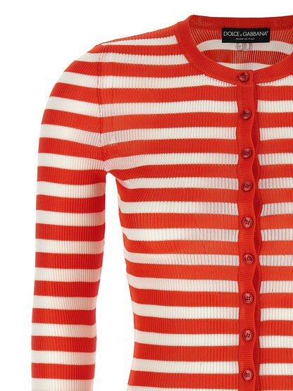 Cardigan by Dolce & Gabbana for women in viscose orange, patterned & striped features a dramatic silhouette, showcasing a sophisticated crew neckline and dramatic detail for a timeless, premium look.
