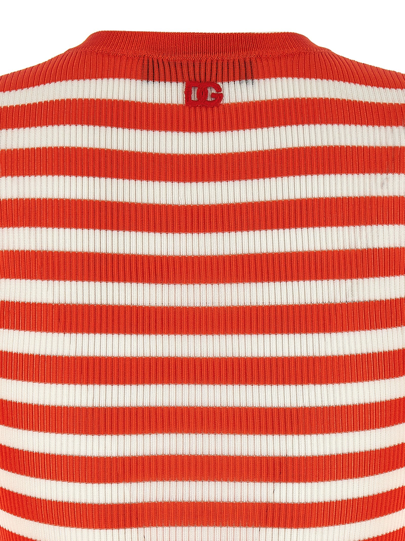 Cardigan by Dolce & Gabbana for women in viscose orange, patterned & striped showcases a captivating silhouette, artfully detailed with a captivating and crew neckline for a truly sophisticated captivating look.