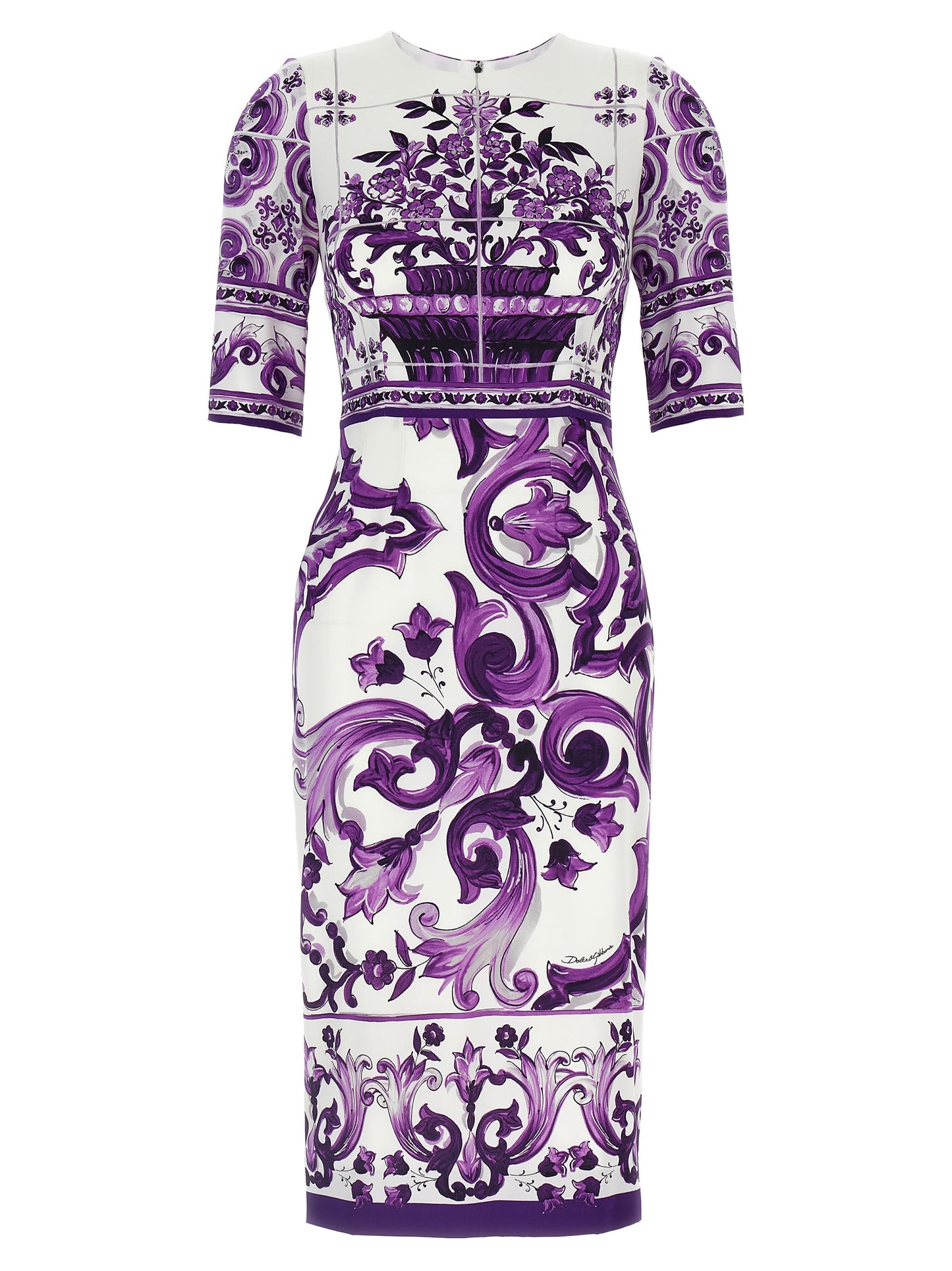 Dress by Dolce & Gabbana for women in silk purple & print features an sultry silhouette defined by a round neckline and three-quarter-sleeve, falling to an sultry midi for a sultry look.
