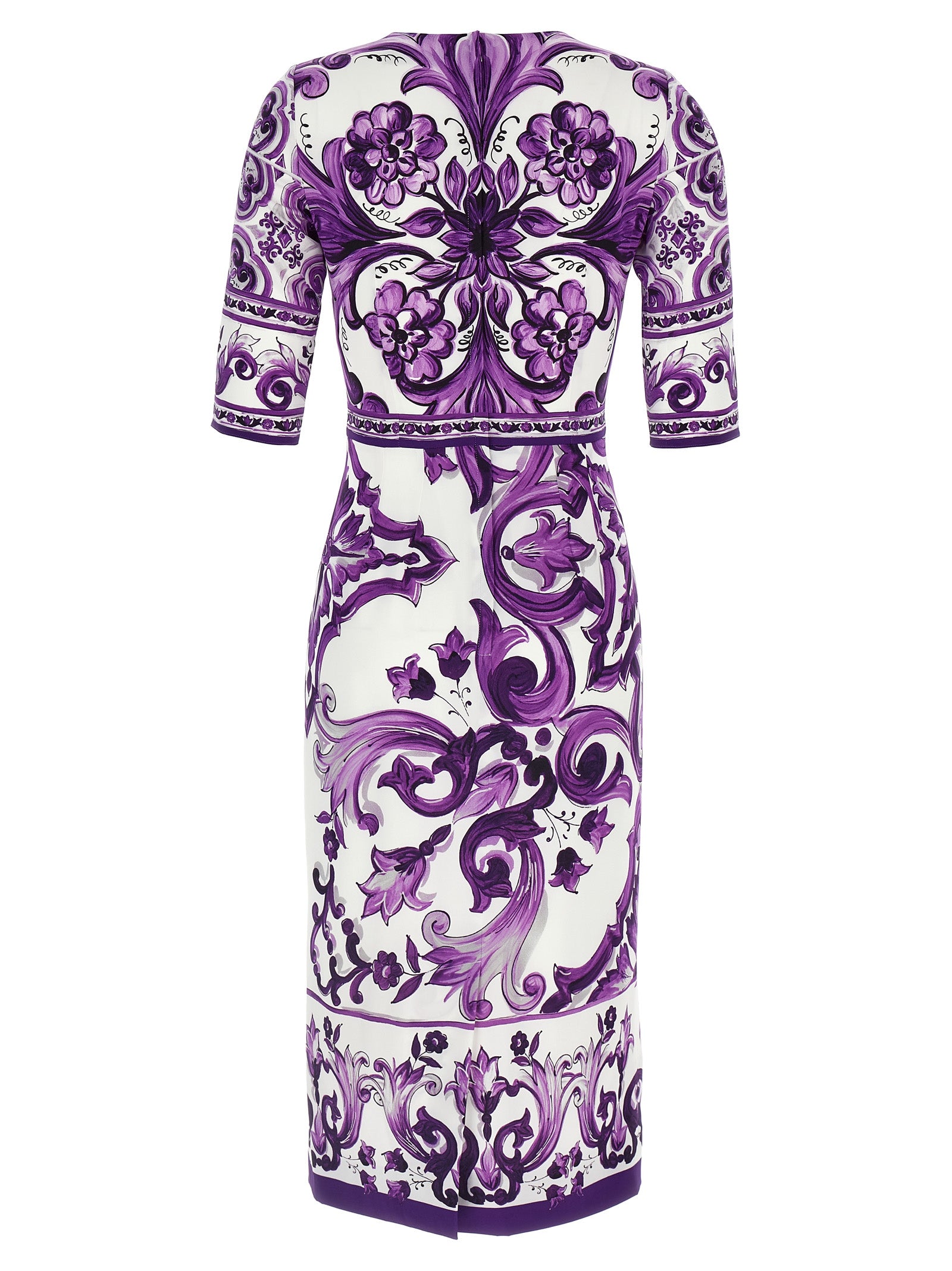 Dress by Dolce & Gabbana for women in silk purple & print features an eye catching silhouette with a sophisticated round neckline, elegant , and a refined midi for a eye catching aesthetic.