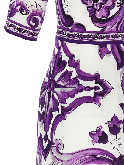 Dress by Dolce & Gabbana for women in silk purple & print features an sultry silhouette defined by a and , falling to an sultry midi for a sultry look.