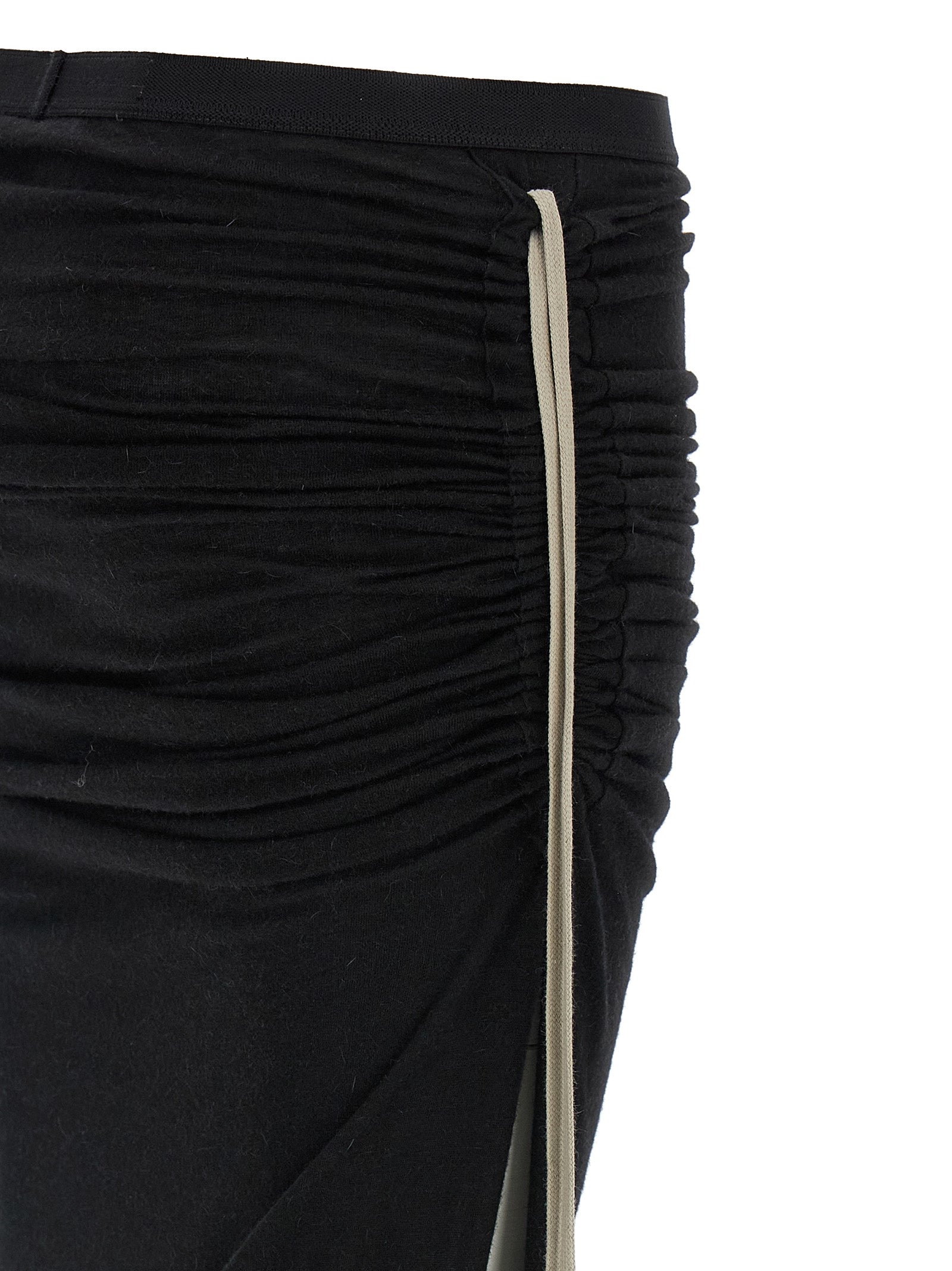 Skirt by Rick Owens for women in nylon & wool black showcases a sultry silhouette, elegantly defined by its mini and the sophisticated sultry design of the Icon Women's Nylon & Wool Mini Skirt.