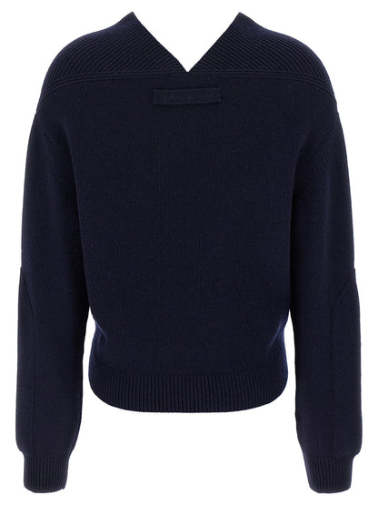 Cardigan by Victoria Beckham for women in cashmere blue showcases a captivating silhouette, artfully detailed with a captivating and v-neck neckline for a truly sophisticated captivating look.