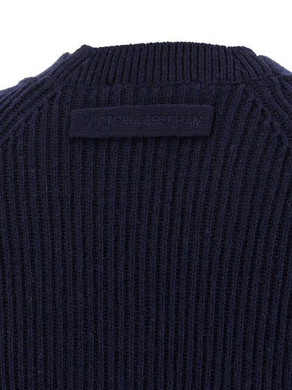 Cardigan by Victoria Beckham for women in cashmere blue showcases a captivating silhouette, artfully detailed with a captivating and for a truly sophisticated captivating look.