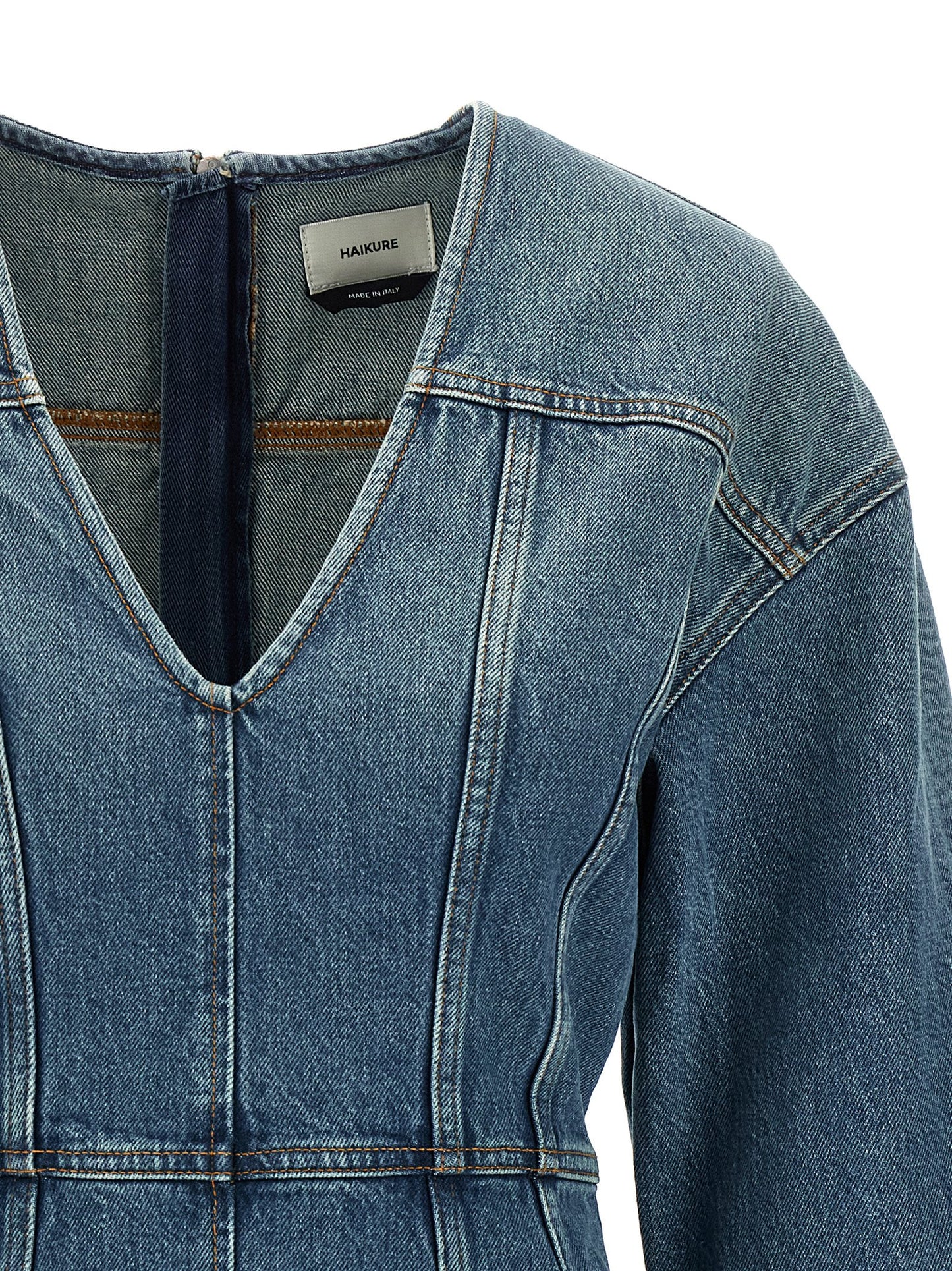 Dress by Haikure for women in denim cotton light-blue features an eye catching silhouette with a sophisticated v-neck neckline, elegant , and a refined short mini for a eye catching aesthetic.