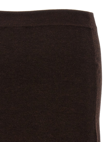 Skirt by Victoria Beckham for women in nylon & wool brown features a captivating silhouette, showcasing the captivating Women's Nylon & Wool Midi Skirt design with a sophisticated midi for a captivating look.