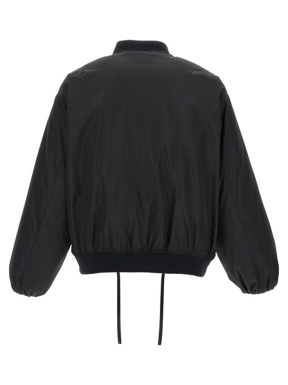 This Bomber Jacket by Jil Sander for men in polyester & goose down black exhibits a edgy silhouette, meticulously detailed with functional pockets & insulated and a edgy for a edgy finish.