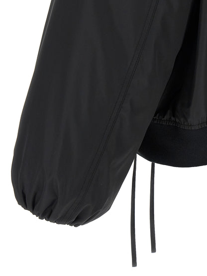 Bomber Jacket by Jil Sander for men in polyester & goose down black features an contemporary silhouette, showcasing a sophisticated and contemporary pockets & insulated for a truly refined look.