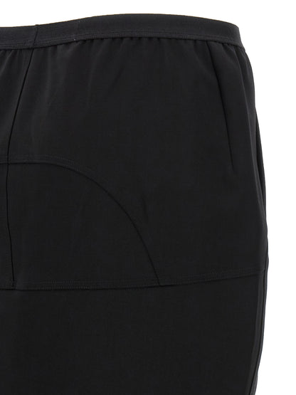 Skirt by Rick Owens for women in nylon & wool black features a sublime silhouette, showcasing the sublime design of the Women's Asymmetrical Nylon & Wool Mini Skirt in a sophisticated mini.