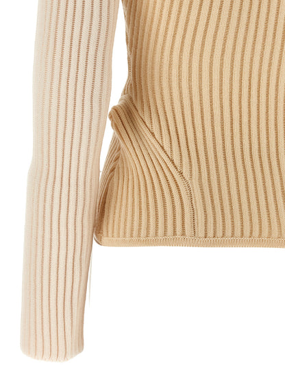 Top by Jean Paul Gaultier for women in merino wool beige features an plush silhouette, artfully detailed with a plush and plush for a truly plush look.