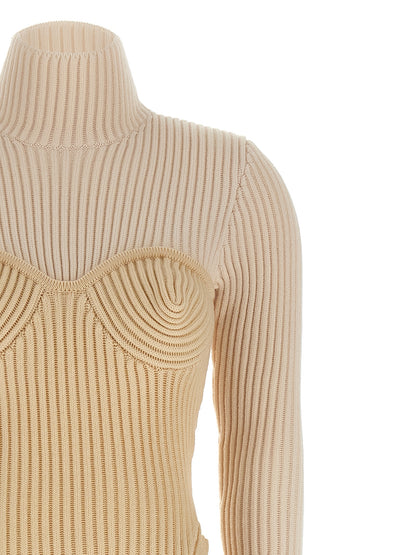 Dress by Jean Paul Gaultier for women in merino wool beige presents a sinuous silhouette, showcasing a sophisticated split high-neck neckline and detailed with a sinuous long for a refined finish.