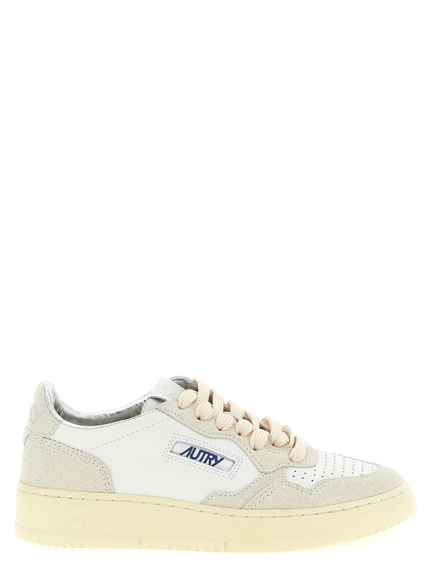 Sneakers by Autry for women in suede cowhide leather beige presents a sumptuous silhouette, artfully capturing the essence of the Women's Low Top Suede Cowhide leather Sneakers with its sumptuous low-top style design.
