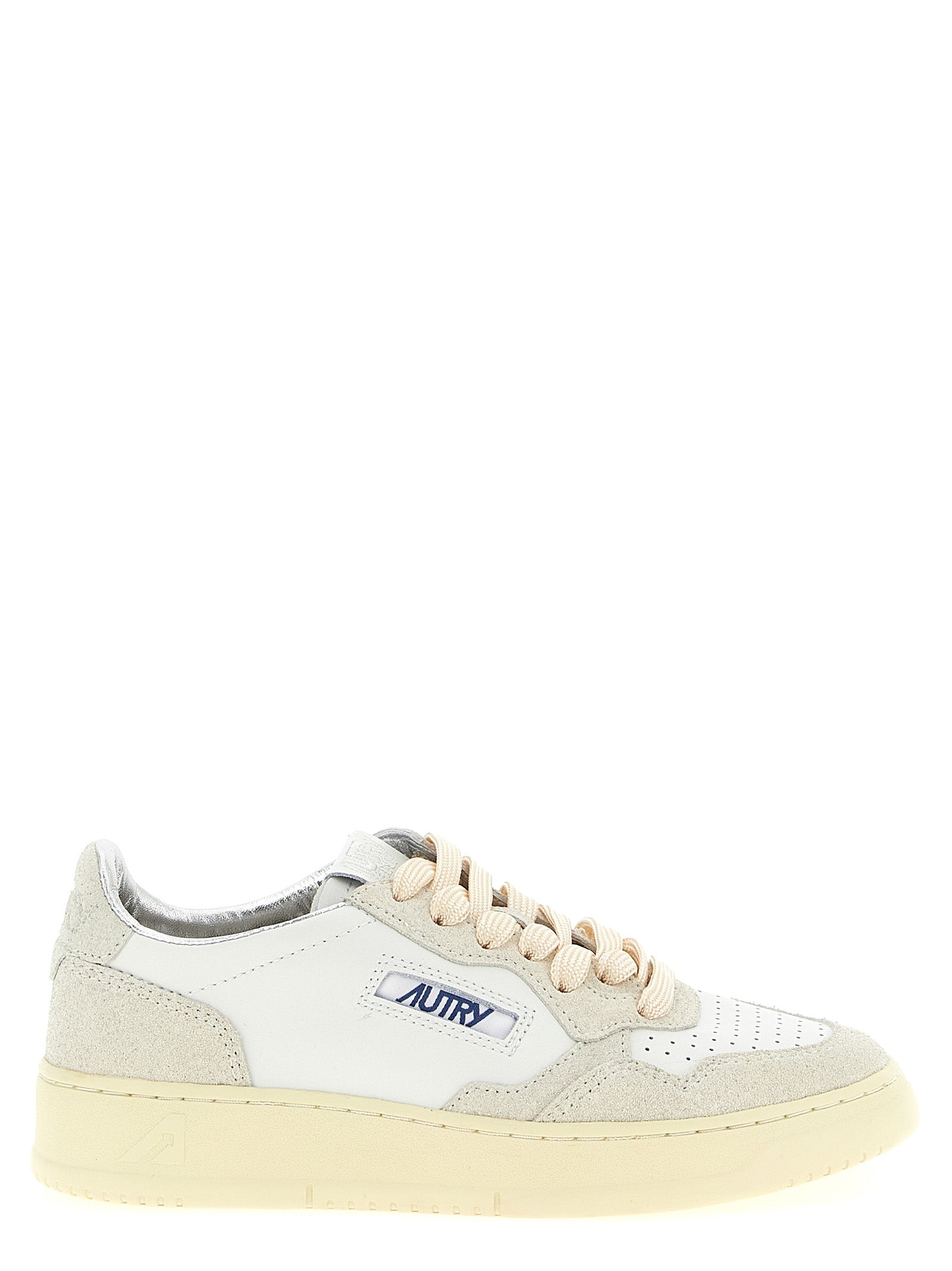 Sneakers by Autry for women in suede cowhide leather beige presents a sumptuous silhouette, artfully capturing the essence of the Women's Low Top Suede Cowhide leather Sneakers with its sumptuous low-top style design.