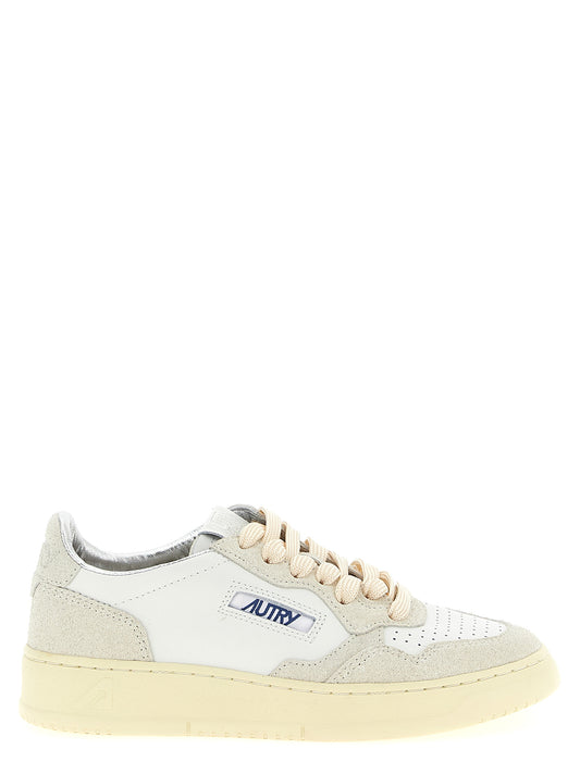 Sneakers by Autry for women in suede cowhide leather beige presents a sumptuous silhouette, artfully capturing the essence of the Women's Low Top Suede Cowhide leather Sneakers with its sumptuous low-top style design.