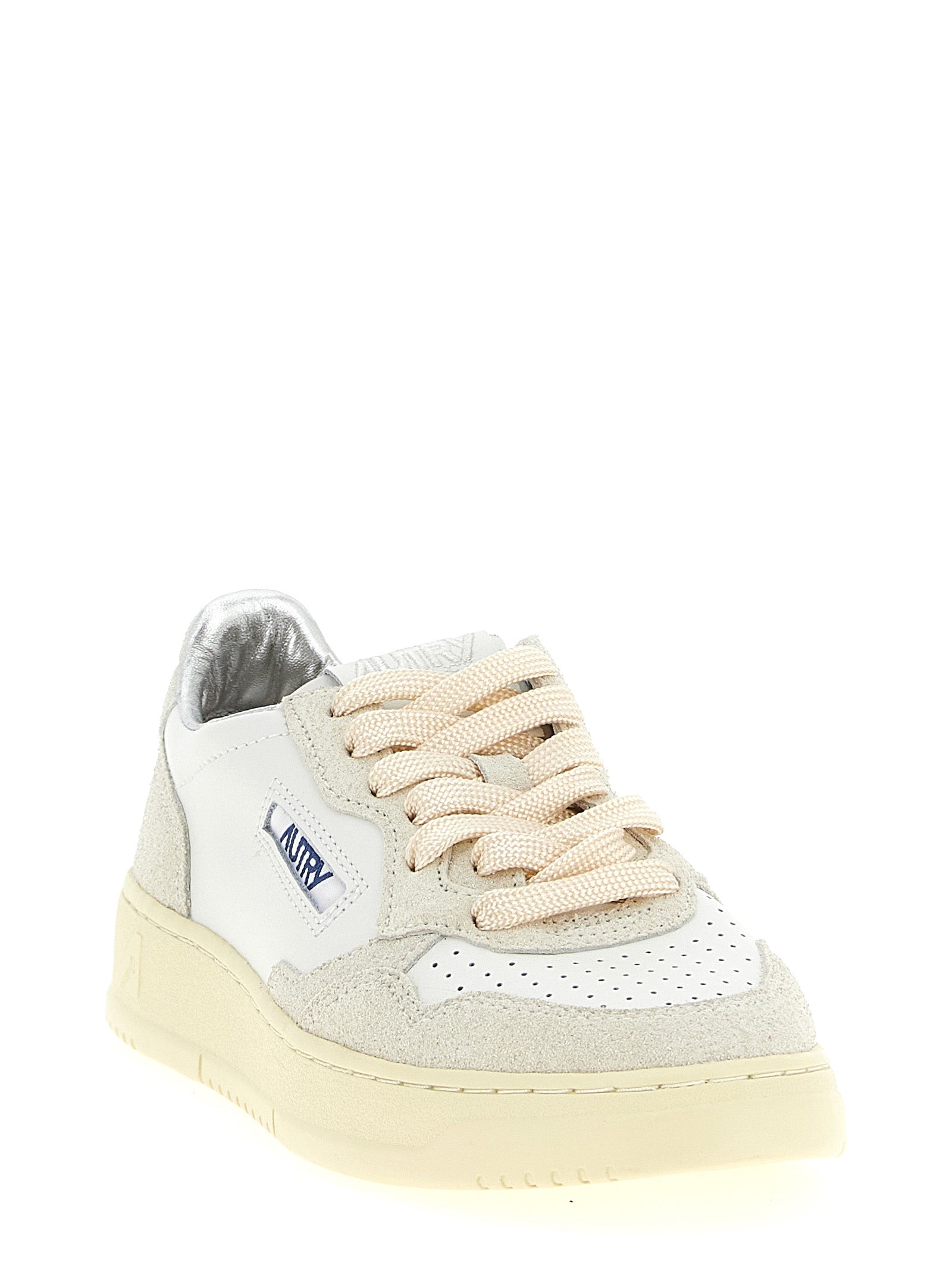 Sneakers by Autry for women in suede cowhide leather beige features an fashionable silhouette, showcasing the premium Women's Low Top Suede Cowhide leather Sneakers in a fashionable low-top style that offers a fashionable finish for refined style.