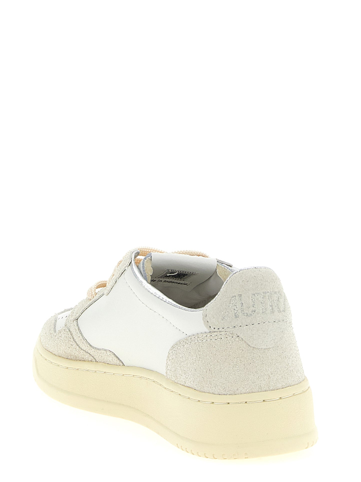 Sneakers by Autry for women in suede cowhide leather beige features a chic design, perfectly showcasing the chic low-top style of this Women's Low Top Suede Cowhide leather Sneakers.
