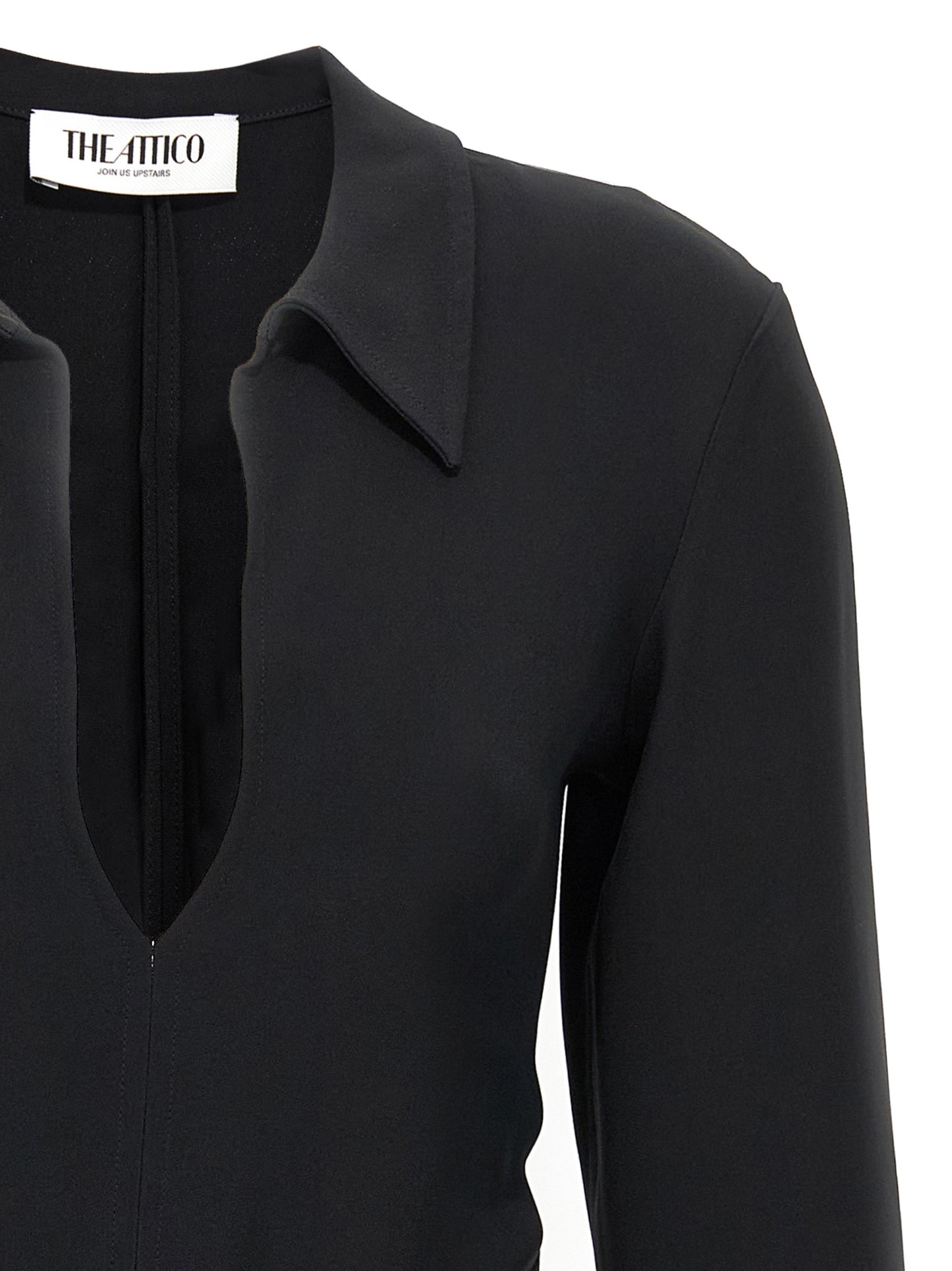Dress by The Attico for women in marabou & viscose black showcases a striking silhouette, elegantly detailed with a , refined v-neck neckline, and a striking short mini for a striking finish.